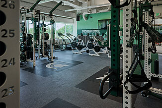 REGUPOL crash drop zone platforms in the Michigan State University weight room.