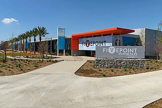 The FivePoint Arena holds the Anaheim Ducks Practice Training Facility. The image demonstrates the expansiveness of the new construction project, showcasing the upscale appearance. 