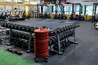 View of the Elite Training Systems located at Iroquois Park Sports Centre. The dumbbell racks rest atop REGUPOL aktivpro roll flooring. 