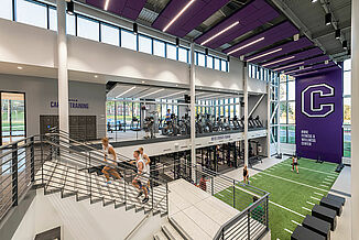 Cornell College's Athletic and Wellness center that features REGUPOL flooring throughout the facility. A view of the cardio area upstairs and the weight training facility on the lower level.