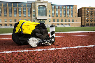 Running equipment on St. John's REGUPOL track