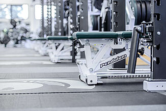 View of REGUPOL crash zones located within the Michigan State football weight lifting facility.