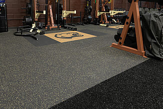 View of the transition between turf system and REGUPOL rubber flooring in the Hershey Bears weight room in the GIANT Center.  