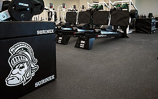 Variety of fitness equipment such as plyometric boxes are offered to Michigan State hockey players.