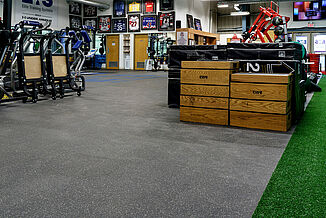 Plyometric boxes rest on REGUPOL aktivpro roll flooring at the Elite Training Systems facility at Iroquois Park Sports Centre. 