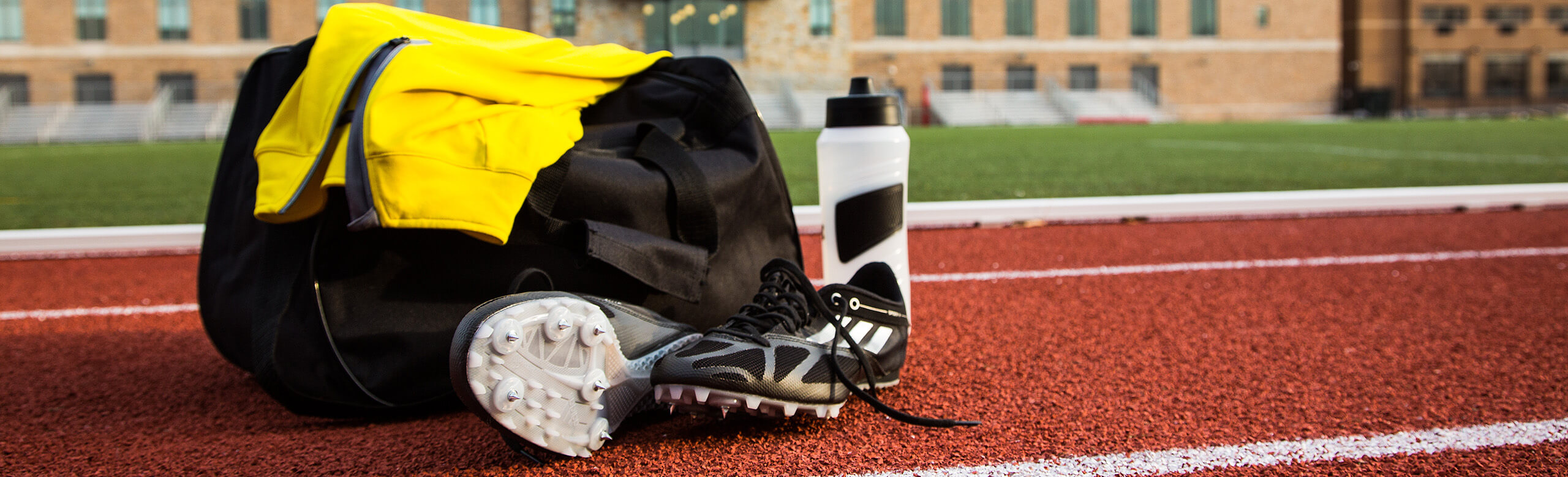 Running equipment on St. John's REGUPOL track