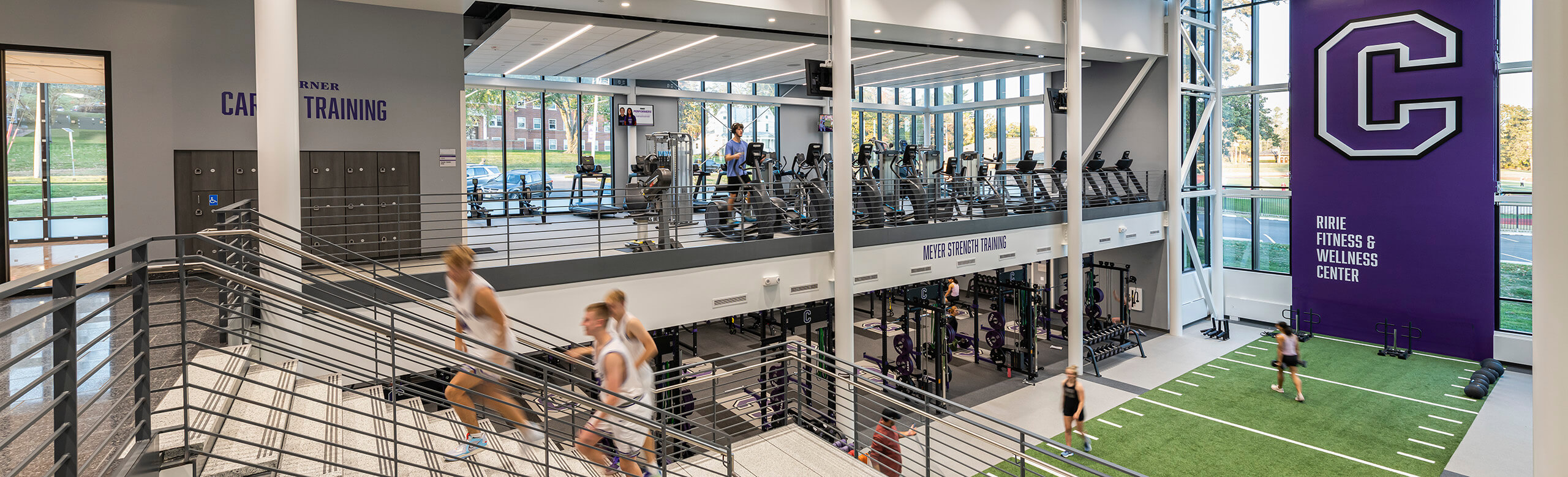 Cornell College's Athletic and Wellness center that features REGUPOL flooring throughout the facility. A view of the cardio area upstairs and the weight training facility on the lower level.