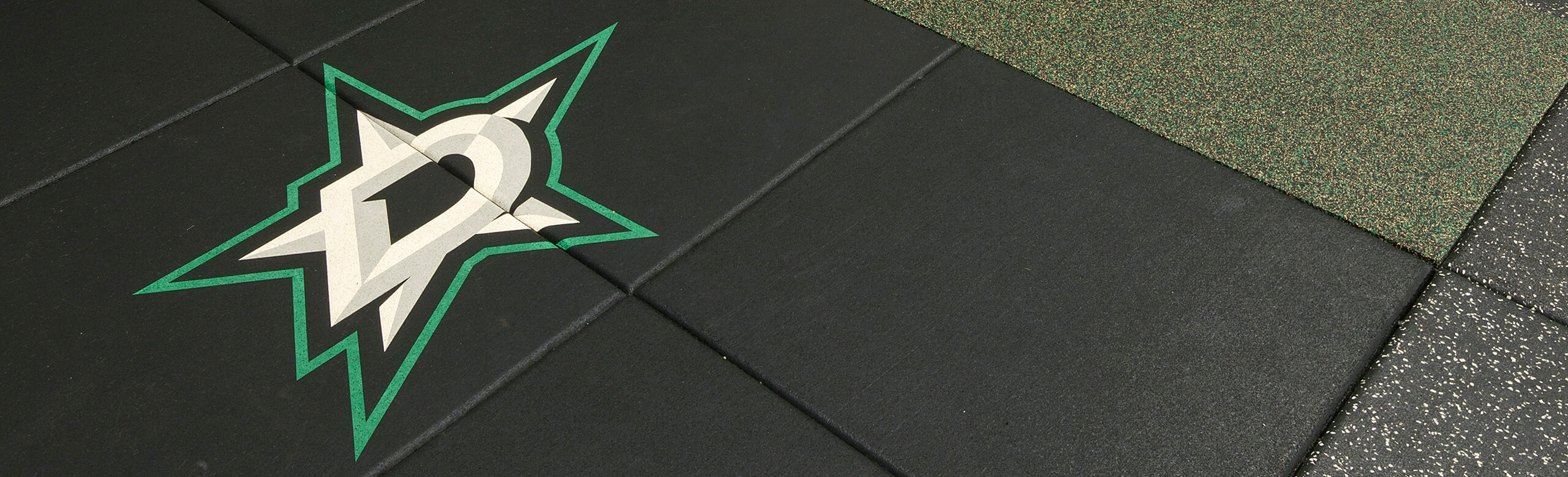 REGUPOL aktivpro tiles were used throughout the Dallas Stars weight training facility. The Dallas Stars logo is inlaid into the tiles.