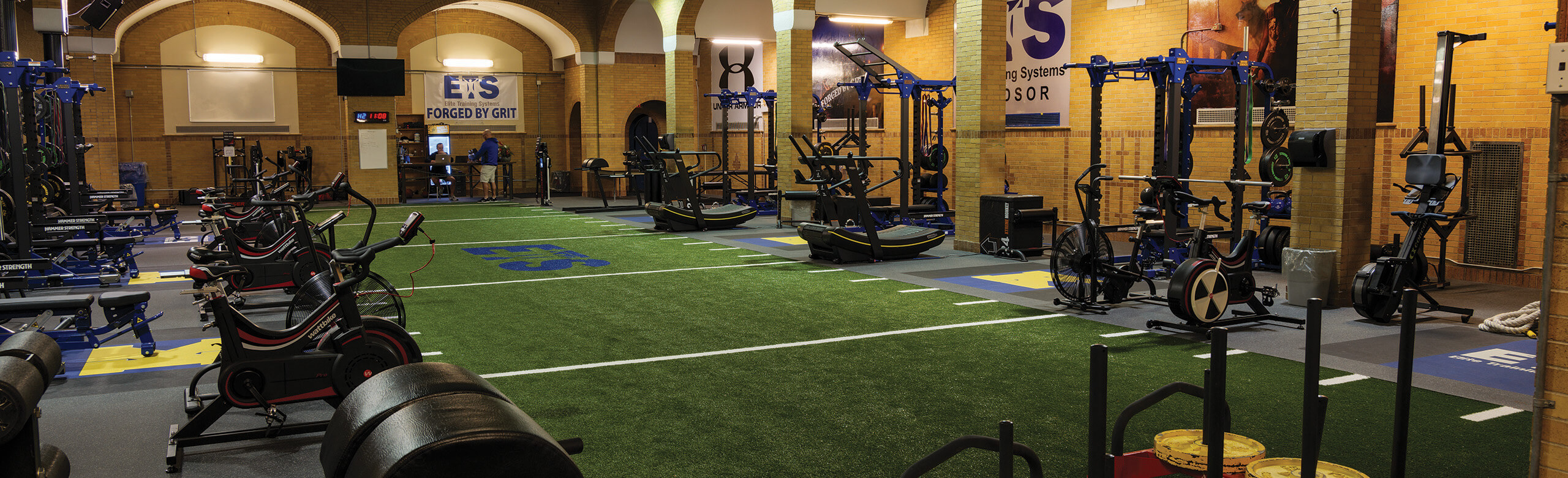 Elite Training Systems features a variety of athletic training information, help athletes' performance excel. Equipment from cardio bikes and weight racks and a number of others are featured throughout the facility, along with REGUPOL aktivpro roll flooring.